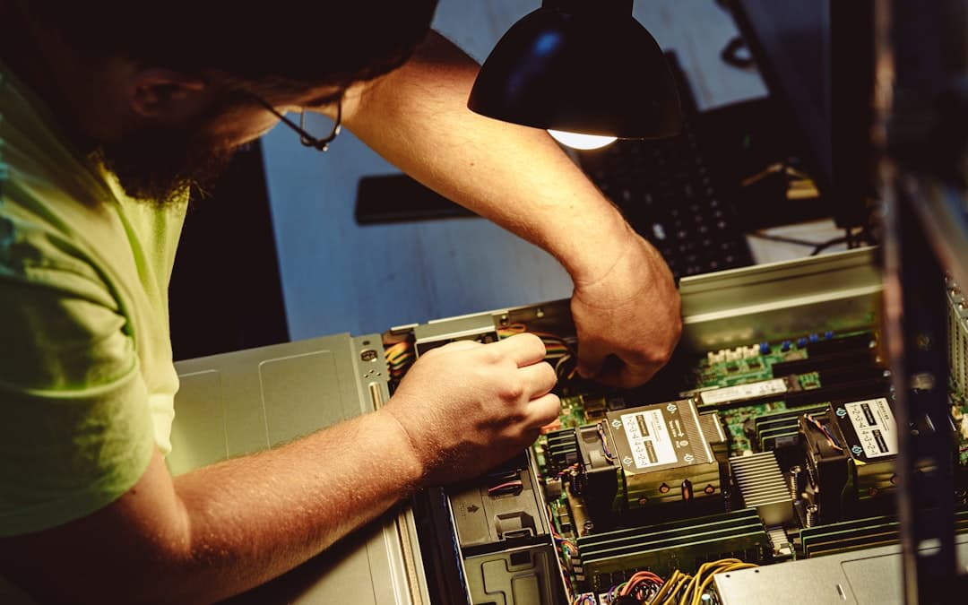 Engineer installing laboratory hardware