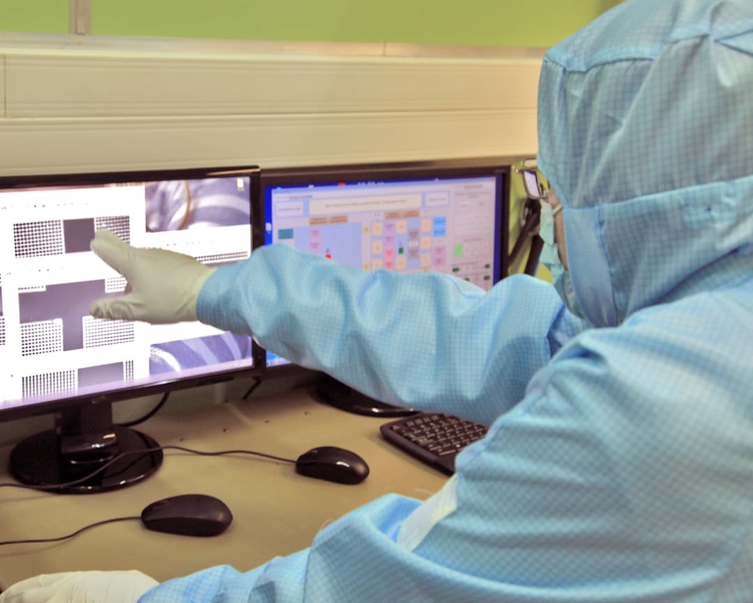 Engineer setting up Air Allergen AI system on-site