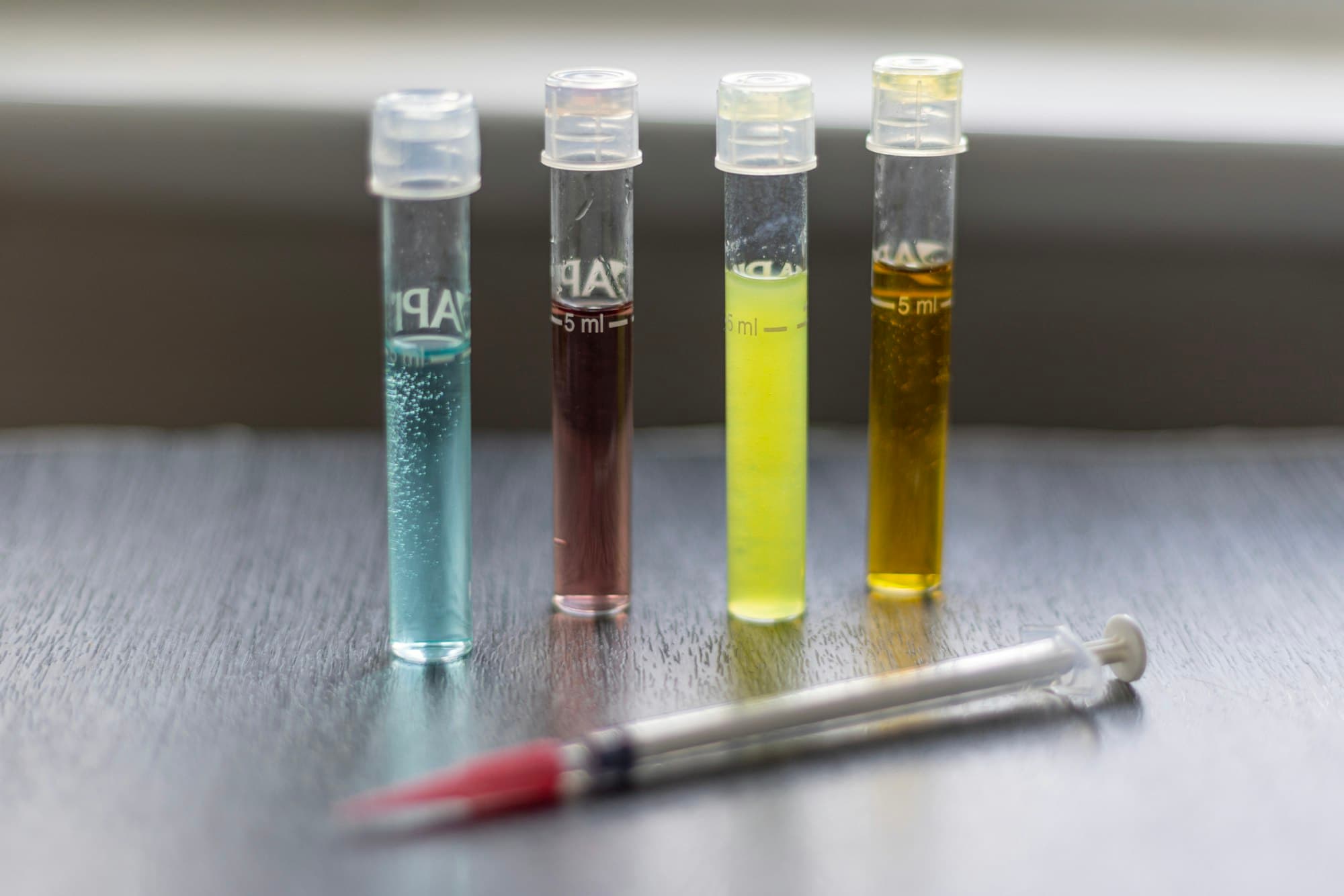 Colorimetric water-sample test tubes used for coliform and E. coli analysis